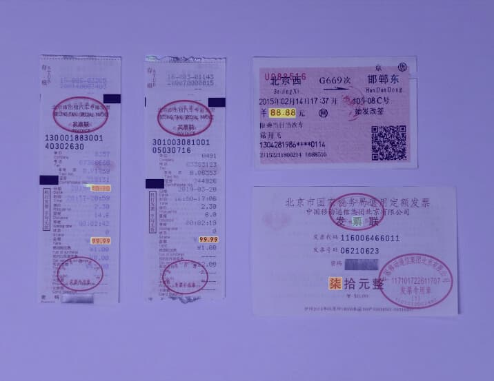 Document with heatmap visualization showing tampered regions detected by forgery detection AI